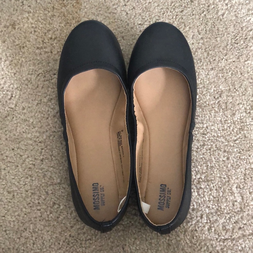 black faux leather flats